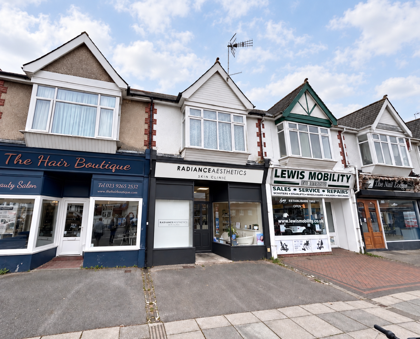 Recently acquired shop and flat at Radiance Aesthetics, pictured within the surrounding high street parade